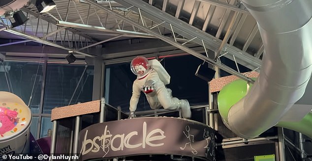 In the main dining area, Dylan found an 'astronaut Ronald McDonald' hanging from the ceiling