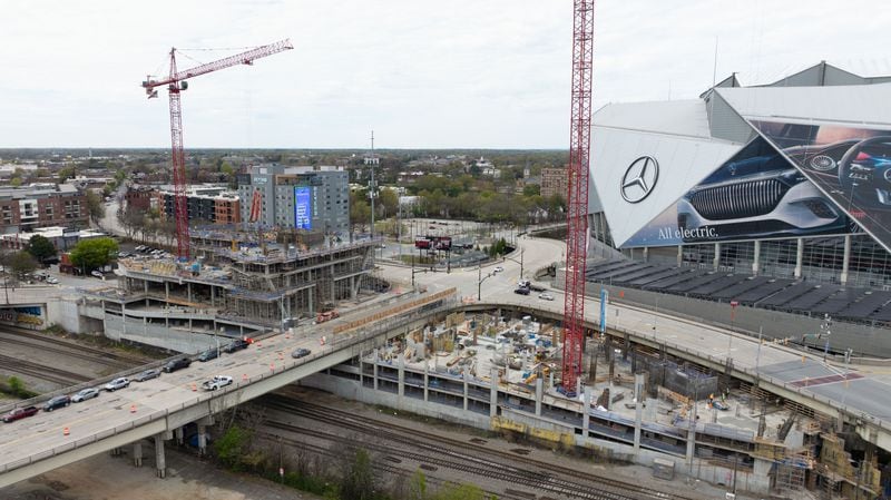 A drone image shows the progress of the first two buildings in the Centennial Yards development project. One will include a 304-unit apartment tower, while the other is a 292-room hotel.
Miguel Martinez /miguel.martinezjimenez@ajc.com