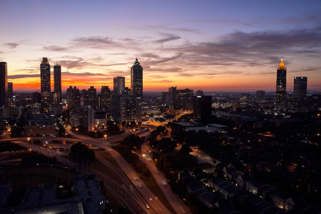 ATLANTA, GEORGIA / UNITED STATES - OCTOBER 8 2020: The orange sky of Fall over Atlanta enhanced the beauty of the Atlanta skyline.